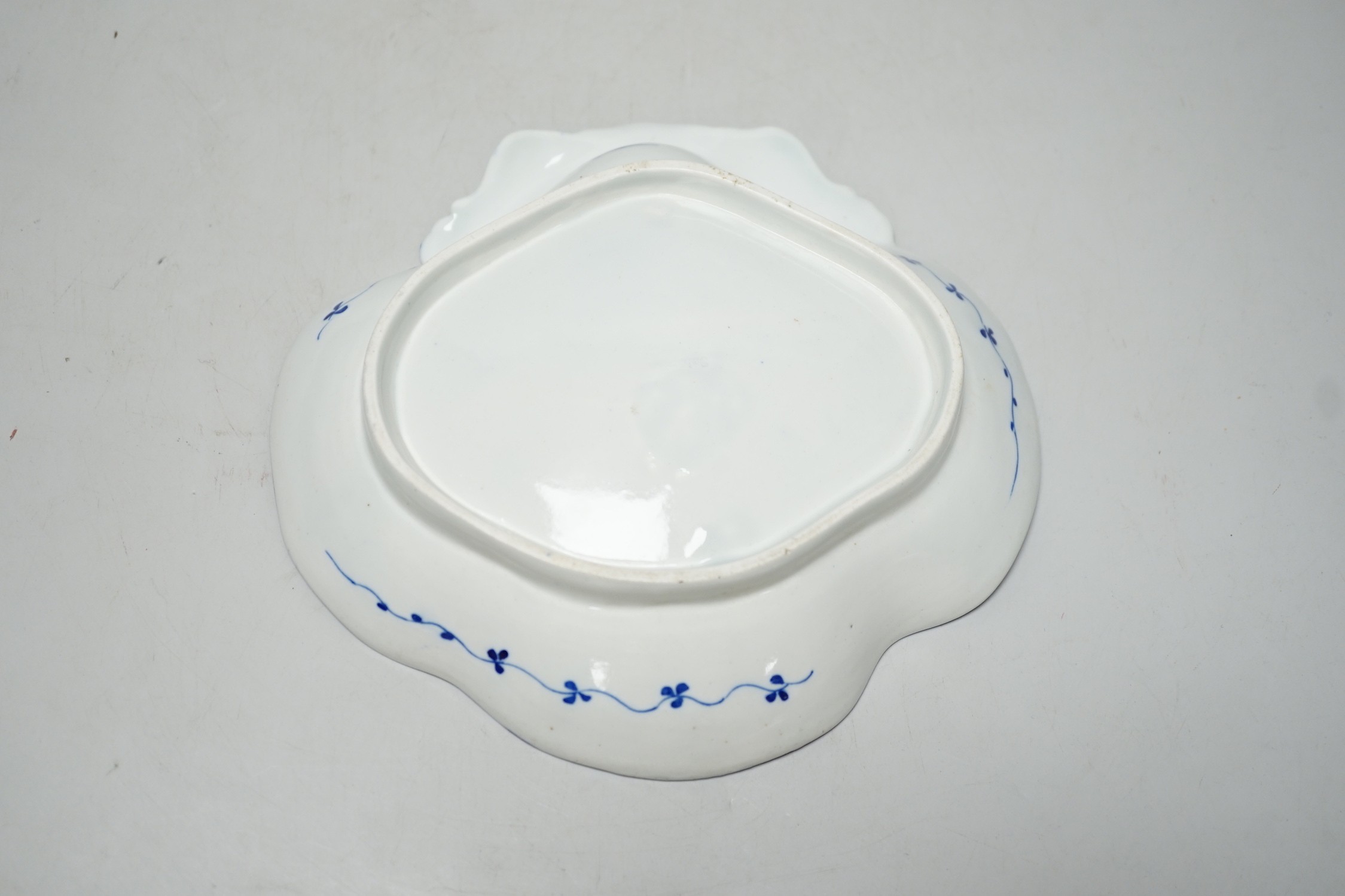 An 18th century Caughley shell dish painted with Bright, Sprigs, impressed Salopian, 19.5cm wide